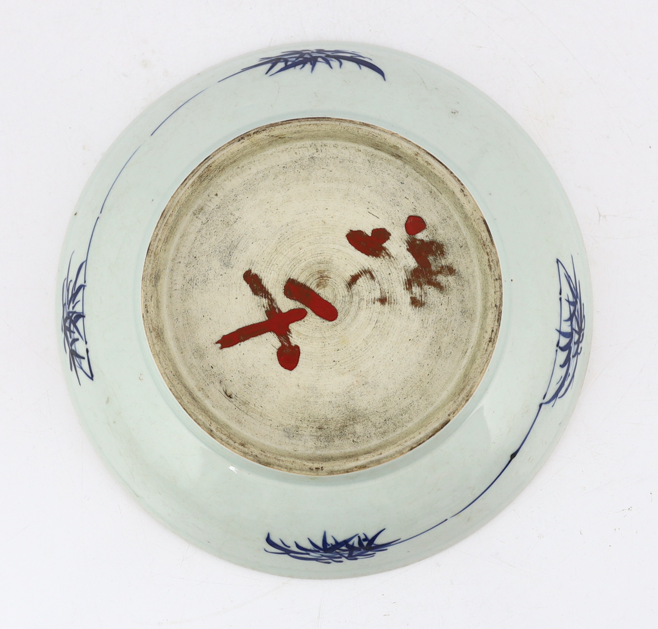 A large Chinese blue and white ‘mythical beasts’ saucer dish, Yongzheng period